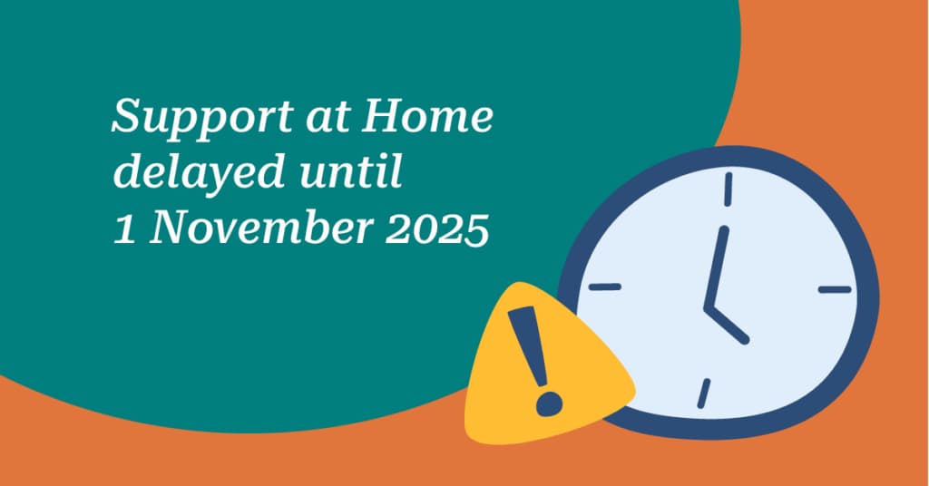 Illustration with text "Support at Home delayed until 1 November 2025," featuring a clock and a warning symbol.