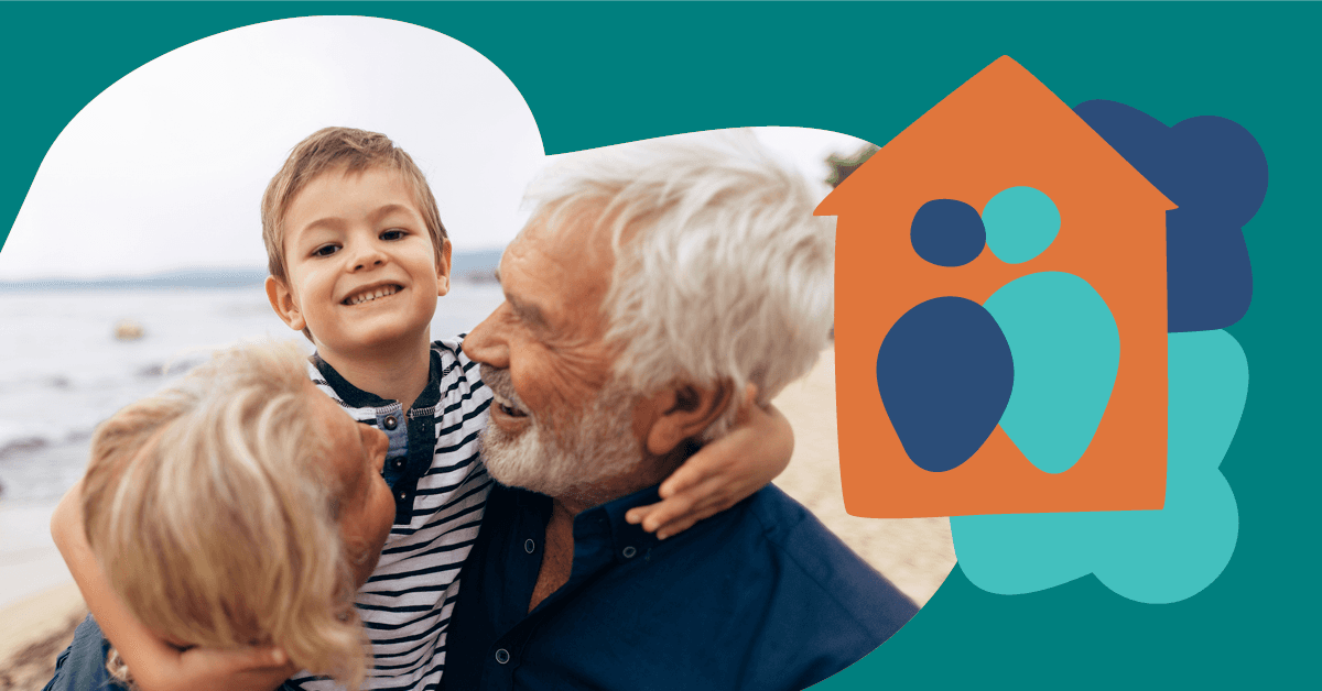 A smiling child is held by two older adults on a beach. An abstract house symbol with figures is on the right.