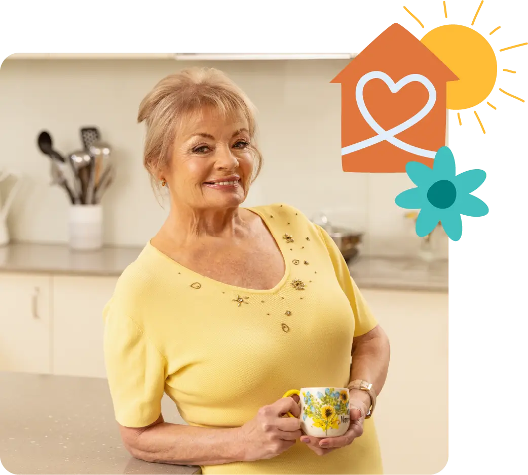 Paula Duncan smiling in the kitchen