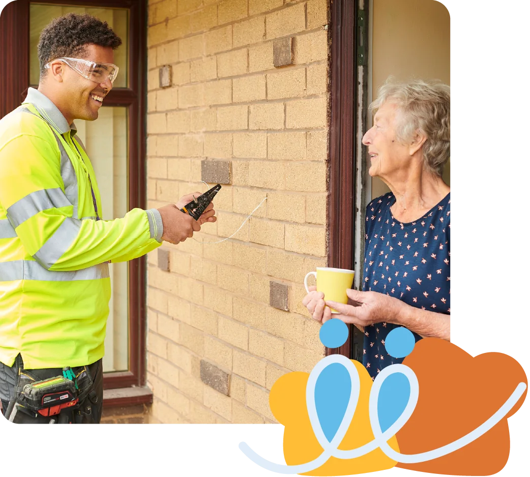 A tradesperson talking with an older woman at her front door