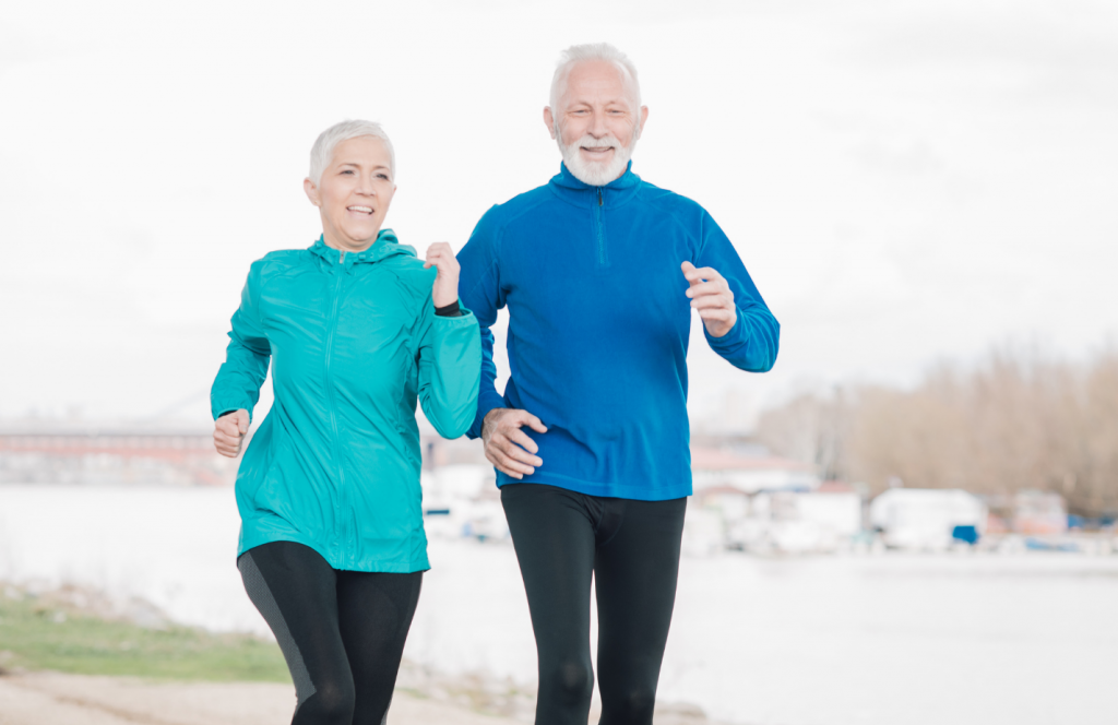 Elderly couple running